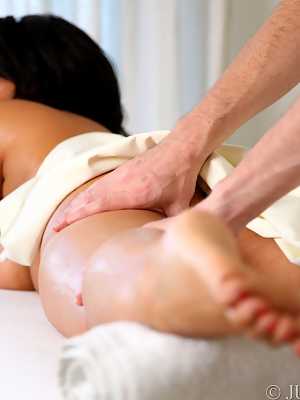 Hot mature woman Danica Collins receives a full body massage from her masseur