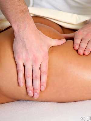 Hot mature woman Danica Collins receives a full body massage from her masseur