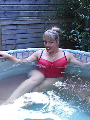 Hot fatty mature Danielle T sheds swimsuit to pour cold water on her big tits