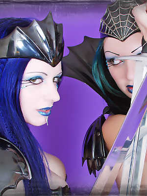 Goth girls Scar13 and Darenzia indulge in sword play during a cosplay shoot