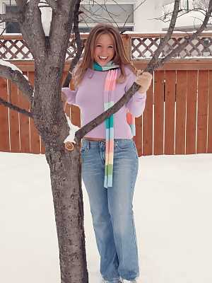 Glamour model Dawson Miller shows her tits and pussy on snow-covered ground