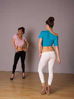 Sexy MILFs Devon Michaels and Veronica Avluv stretch in sexy tights