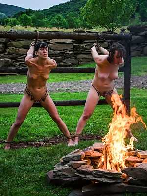 Naked slaves Elise Graves & Dixon Mason forced to deepthroat on the farm