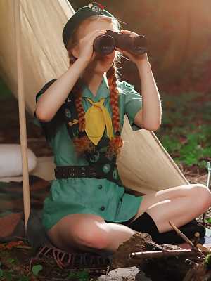 Redheaded Girl Scout Dolly Little gets naked outside her tent in beret