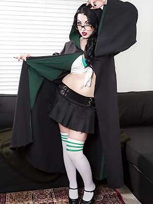 Nerdy goth Draven Star sheds skirt to model naked in over the knee socks