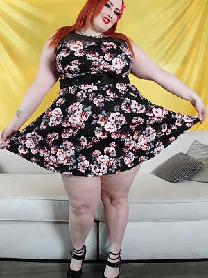 Obese redhead Eliza Allure strips down to her footwear before a POV blowjob