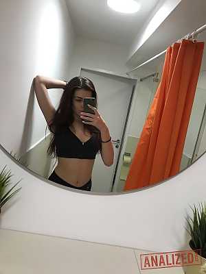 Russian teen Emily Mayers showing her great ass while taking nude selfies