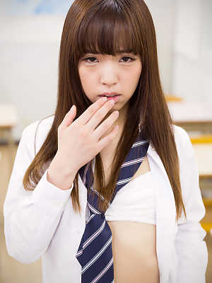 Japanese schoolgirl flashes cotton panties before taking them off in class