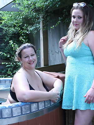 Older BBW has lesbian sex with a teen plumper in a swimming pool