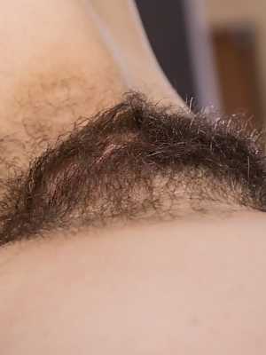 Amateur teen Liza James shows off her hairy vagina and small tits