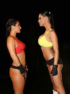 Hot dykes Eva Lovia and Peta Jensen pose in spandex shorts for boxing match