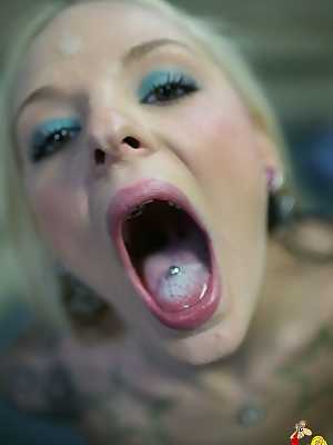 Slender blond Faye Runaway swallows a mouthful of cum after riding a huge dick