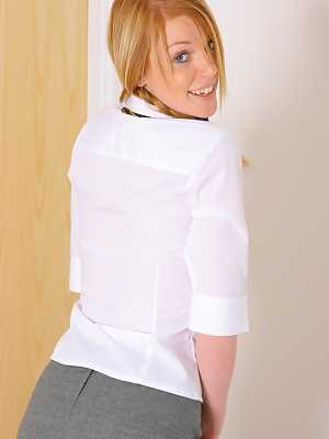 Beautiful blonde schoolgirl Fi teases with her lovely tits and poses in skirt