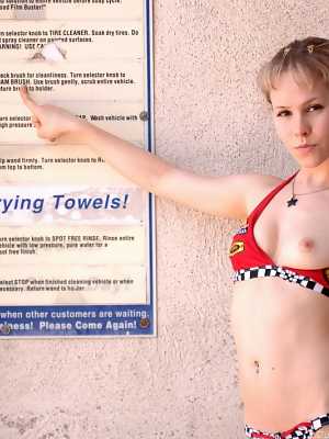 Sexy car wash girl Fiona Luv teasing in her tiny bikini