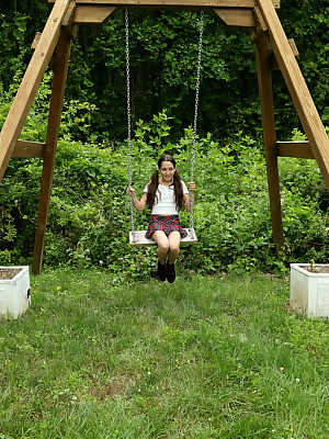 Amateur teen Freya Von Doom pegs her twat and takes a piss on a swingset