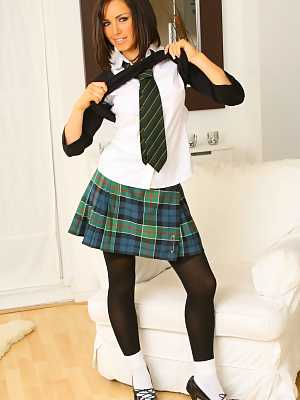 Alluring schoolgirl Gemma Massey doffs her school skirt and teases in lingerie