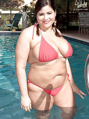 Big titted fatty MILF Gia Johnson with pigtails strips by the pool