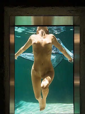 Stunning erotica model Gia Marie posing naked in an underwater photoshoot