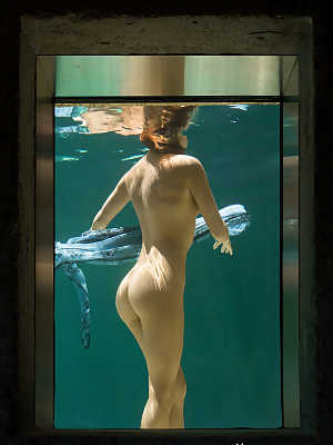 Stunning erotica model Gia Marie posing naked in an underwater photoshoot