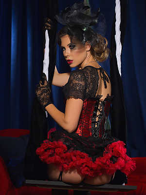 Erotic pinup centerfold Gia Ramey-Gay poses sensuously in garter & stockings