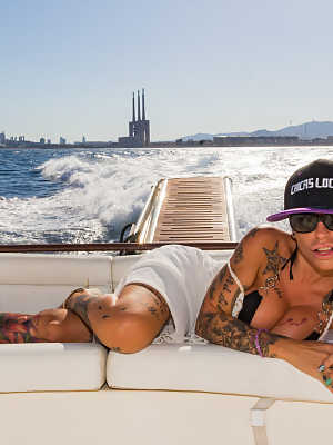 Alternative chick Gina Snake with enhanced big tits fucking on a boat