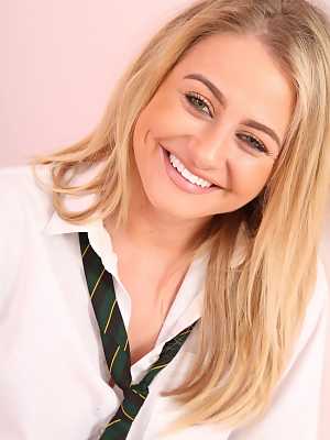 Sexy blonde schoolgirl Gracie B takes her uniform off and flashes her tits