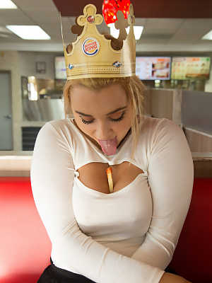Naughty teen Gwen Stanberg licks her big boobs at the Burger King restaurant