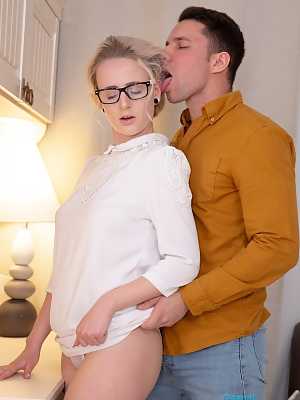 Nerdy blonde girl Hanna Rey spreads her tiny legs and takes a giant dick