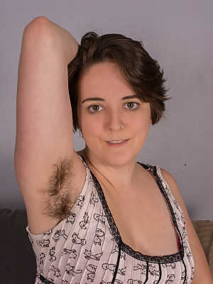 Brunette amateur with hairy armpits Harley Hex flaunts her bushy body