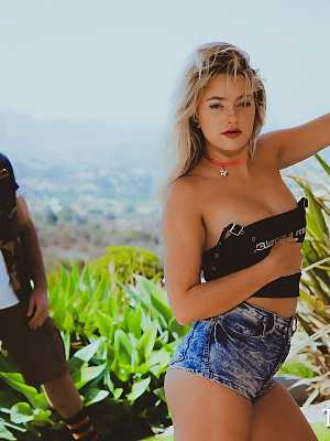 Sexy blonde Harmony Rivers teases a biker outdoors before they fuck inside