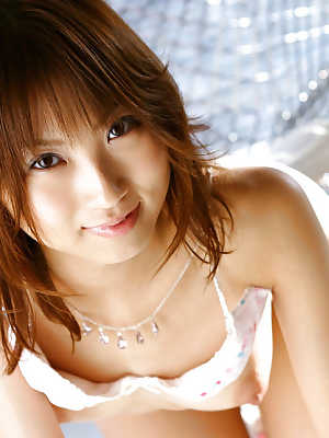 Petite asian babe Haruka Morimura slowly uncovering her tempting body