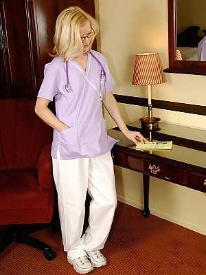 Salacious mature nurse getting nude and teasing her shaggy twat