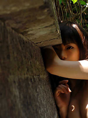 Asian coed with awesome tits Hikari Hino posing topless outdoor