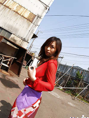 Cuddly asian teen Hikaru Koto flashing her petite tits in a public place