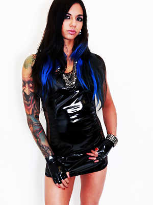 Inked hottie in latex dress Holly D gets taken doggy style while standing