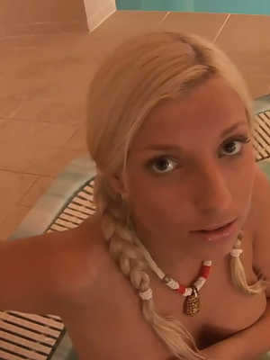 Hot blonde female Holly Fox sinks her nude body into a hot tub