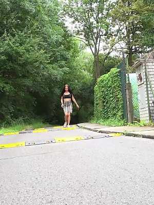 Solo girl Isabel Dark lets loose with a stream pf piss on a public sidewalk