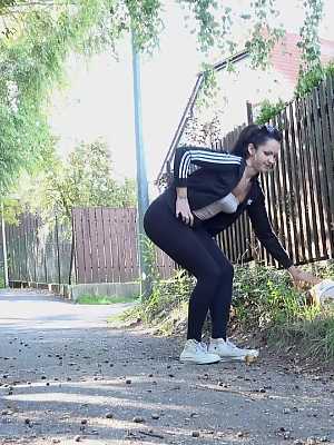 Isabel Dark pulls down her leggings to pee