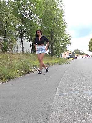 Solo girl Isabel Dark lets loose with a stream of piss on a rural road