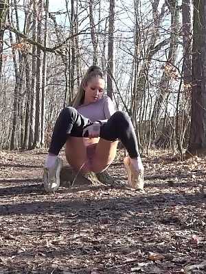 Gorgeous European squats in the woods to piss