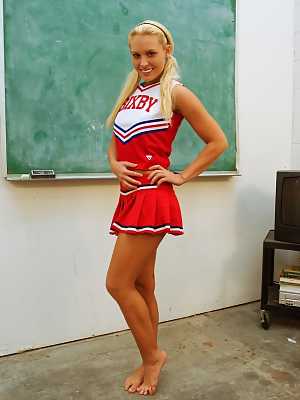 Blonde babe Jamey James flashing upskirt panties in cheerleader uniform
