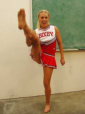 Nasty cheerleader Jamey James stripping and exposing her bare feet