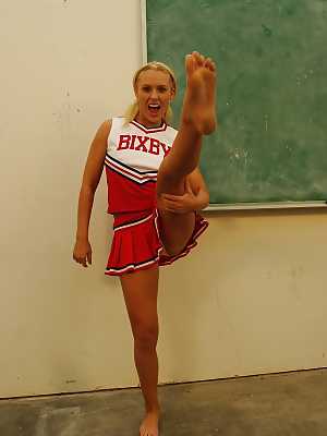 Nasty cheerleader Jamey James stripping and exposing her bare feet