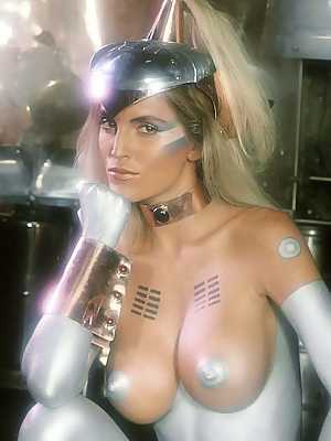 Blonde babe from the future Janine Lindemulder flaunts her big juggs