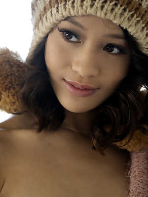 Teen Jasmine Grey reveals her petite body and poses in a winter cap