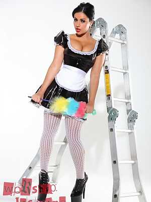 Dark-haired beauty Jasmine Jones models a latex maid uniform in sexy stockings