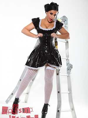 Dark-haired beauty Jasmine Jones models a latex maid uniform in sexy stockings