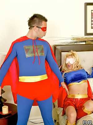 Blindfolded blonde Jennifer Adams fucks in a superhero costume