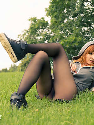 Amateur ginger Jeny Smith	posing in her sheer pantyhose in public