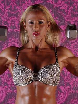 Blonde MILF bodybuilder Jill Rudison showing her strong oiled body in lingerie